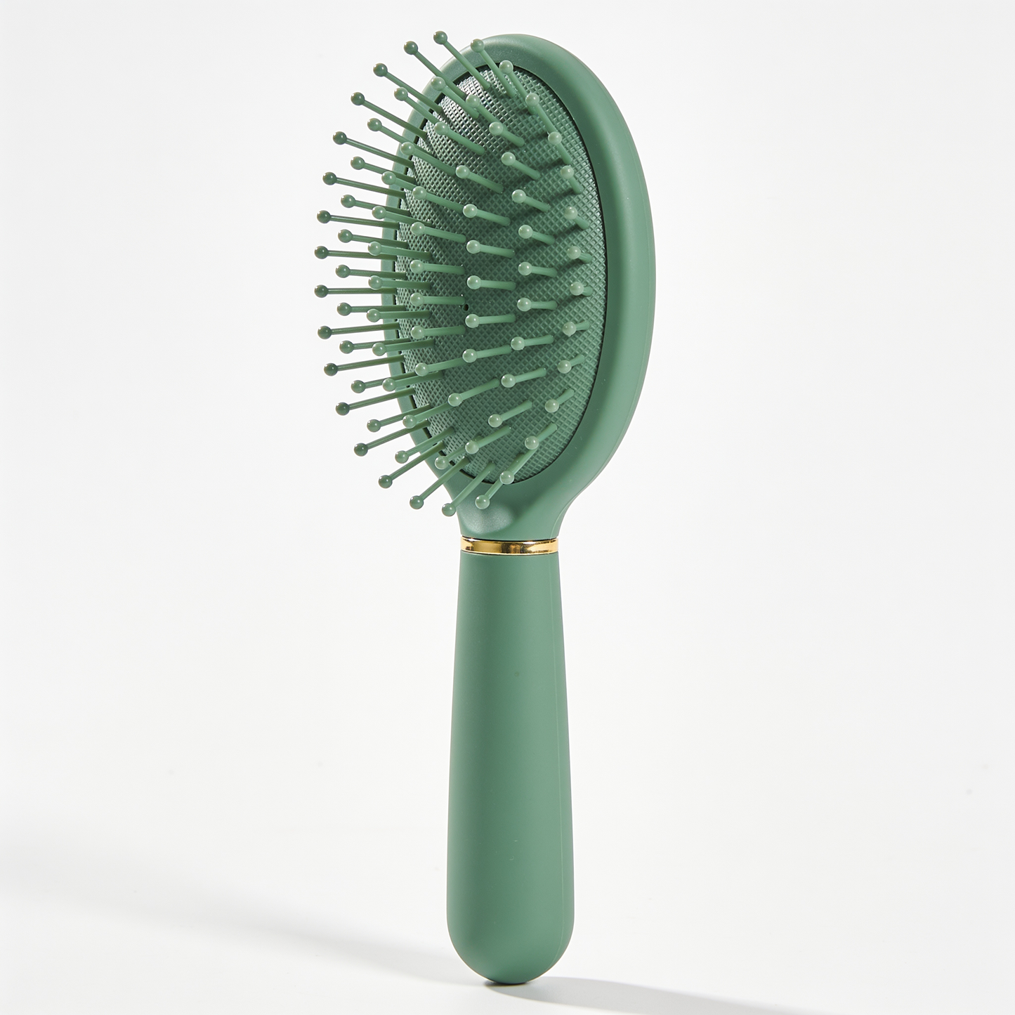 Oval Paddle Brush in Green with Gold Ring and Ball-Tipped Bristles