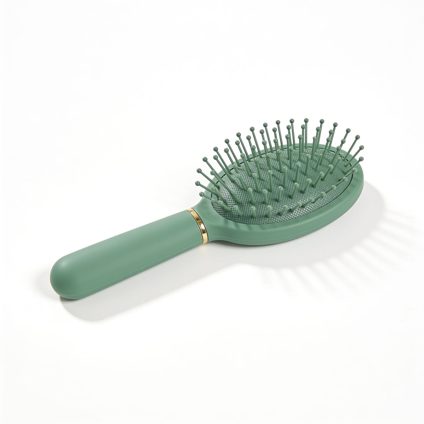 Oval Paddle Brush in Green with Gold Ring and Ball-Tipped Bristles
