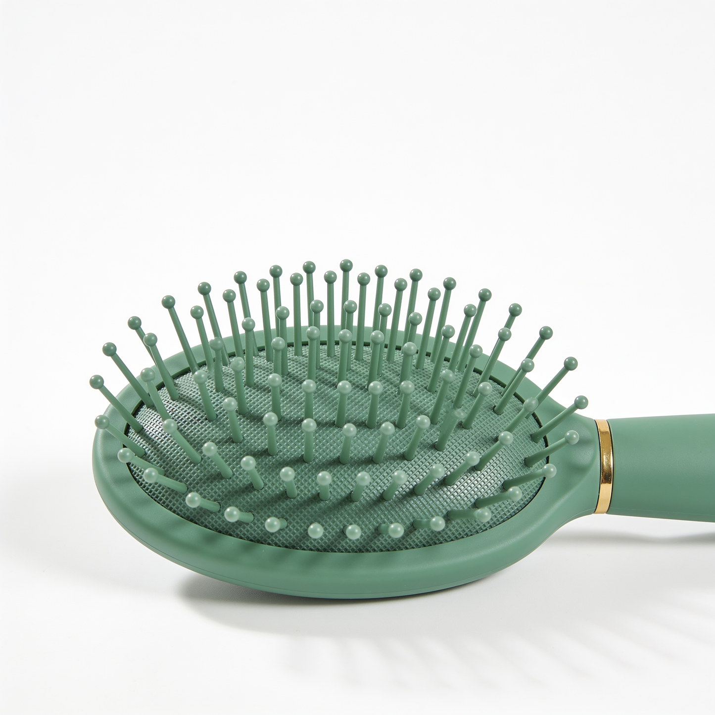 Oval Paddle Brush in Green with Gold Ring and Ball-Tipped Bristles