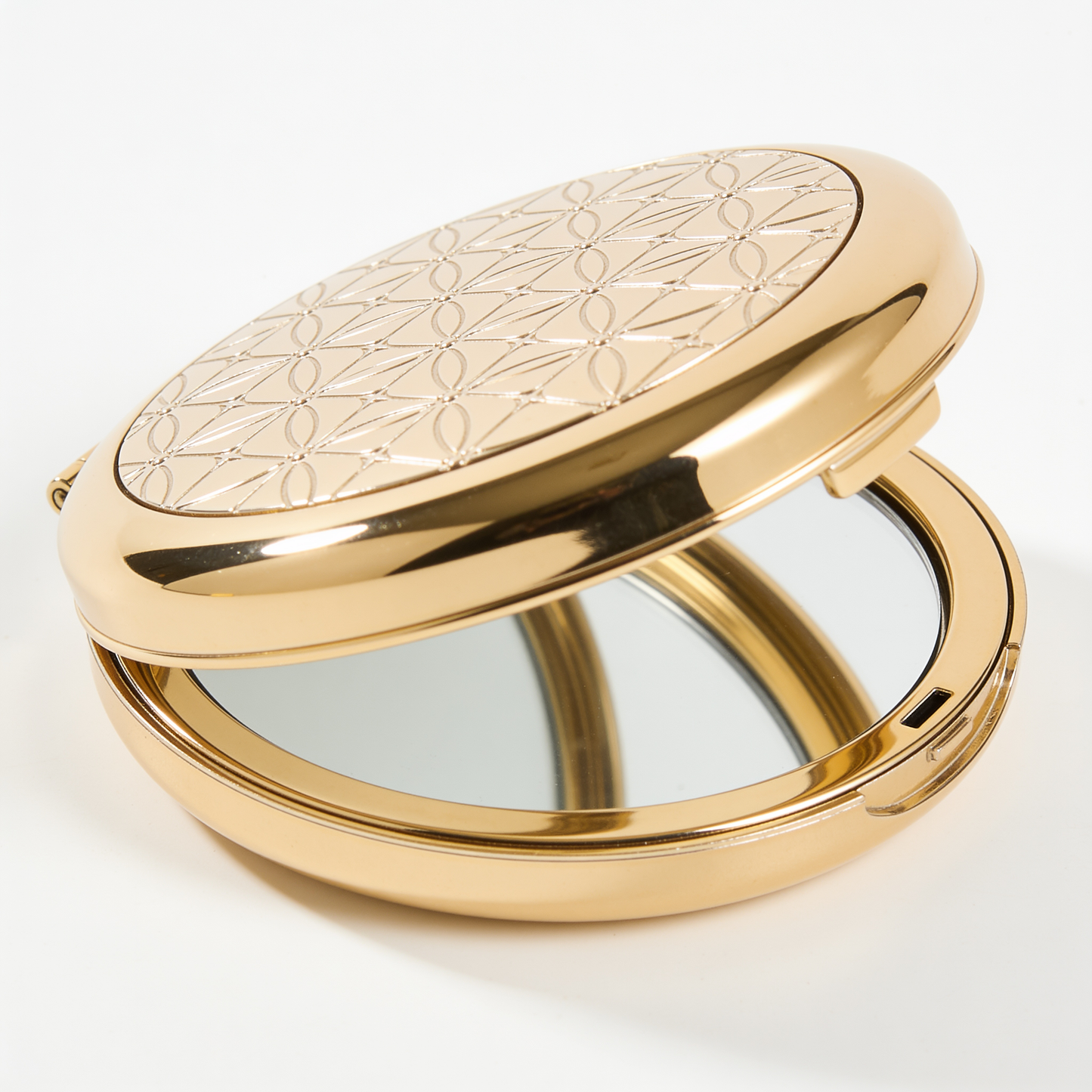 Round Compact Mirror in Gold with Embossed Geometric Lid